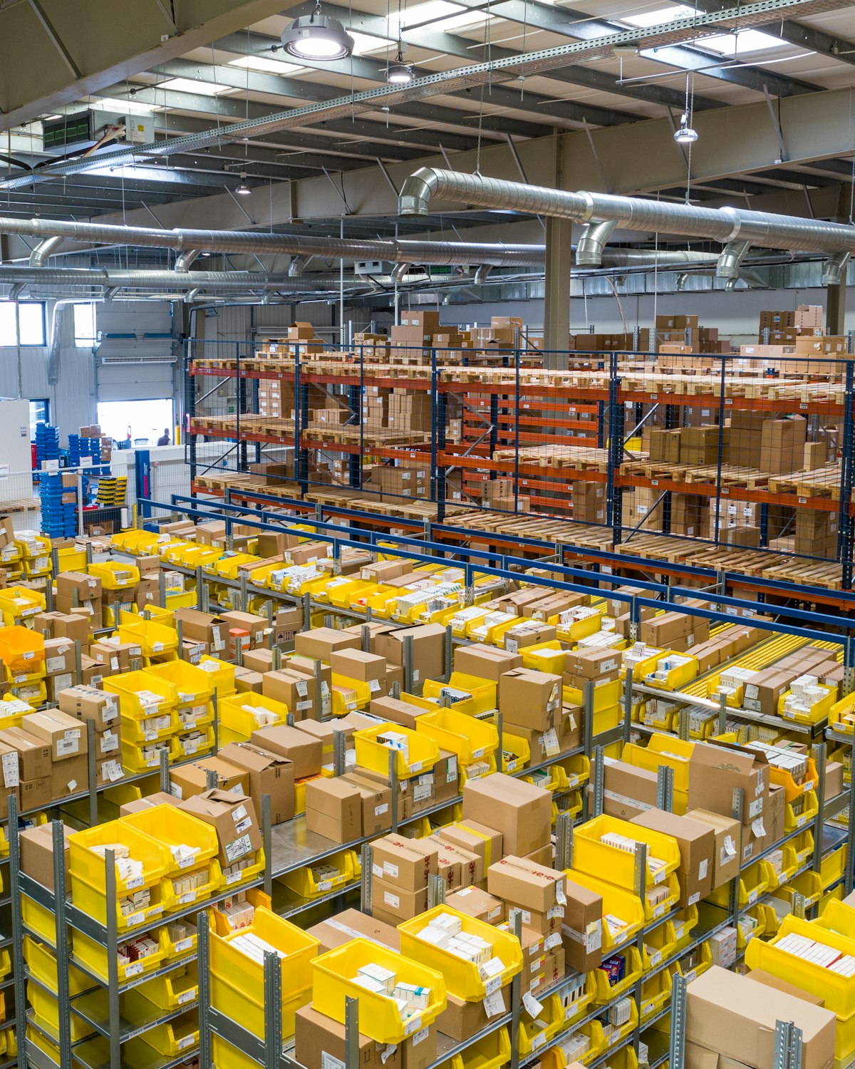 Packaging and staging lines where cartons are prepared for dock and container loading