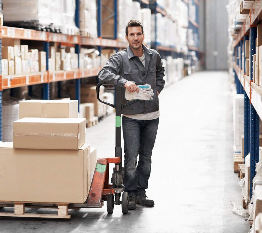 Dock and aisle loading with a trolley moving palletised cartons